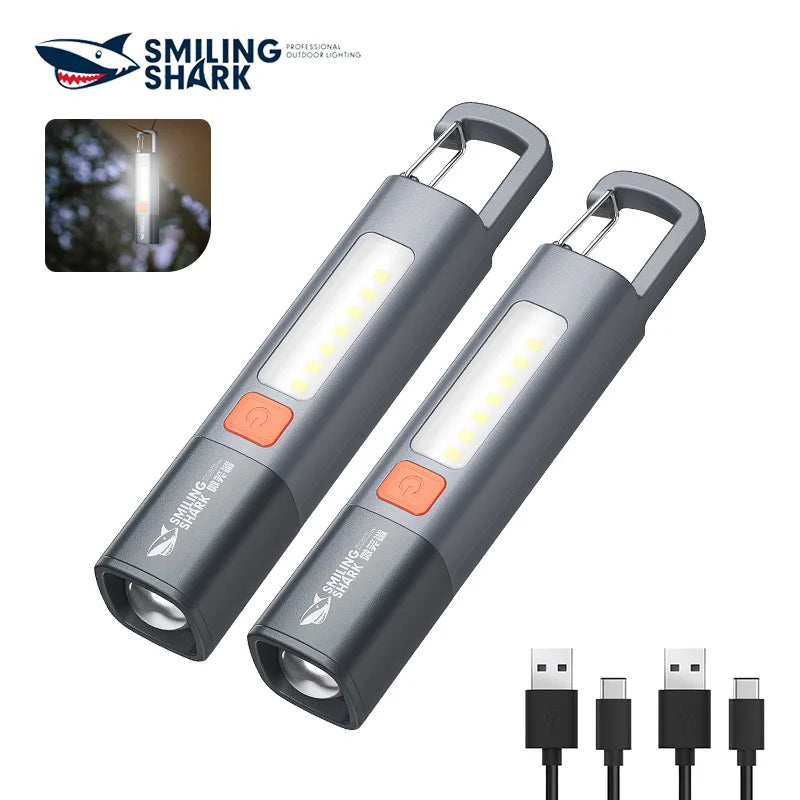 1pc Smiling Shark SD1023 LED Torch Light XPE Super Bright Flashlight with Hook Camping Light Rechargeable Zoomable Waterproof